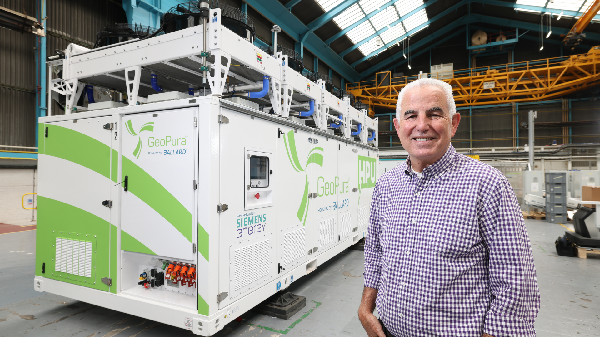 Ballard CEO Marty Neese standing in front of a GeoPura HPU2