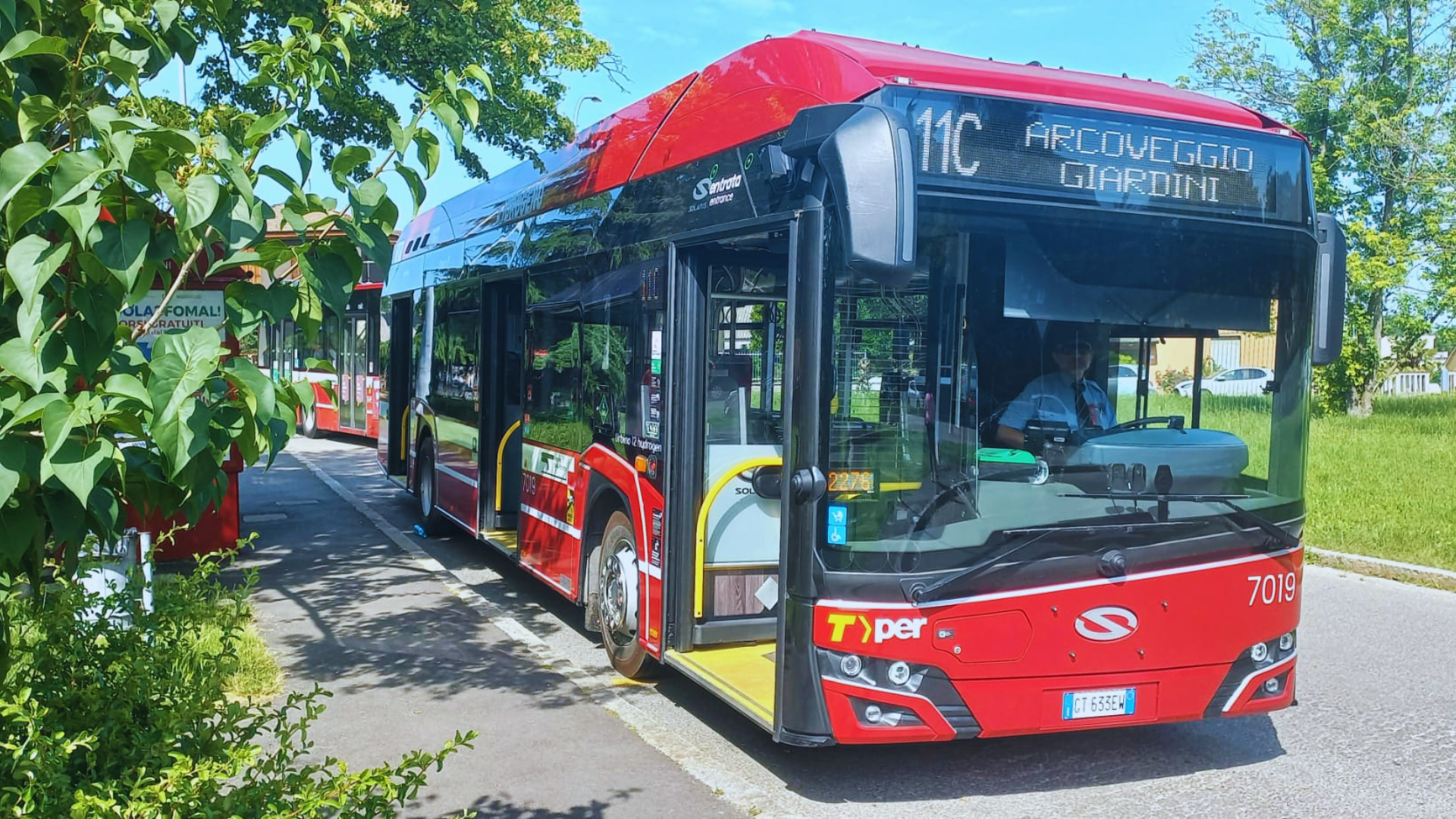 A TPER hydrogen fuel cell bus driving along Bologna's Route 11