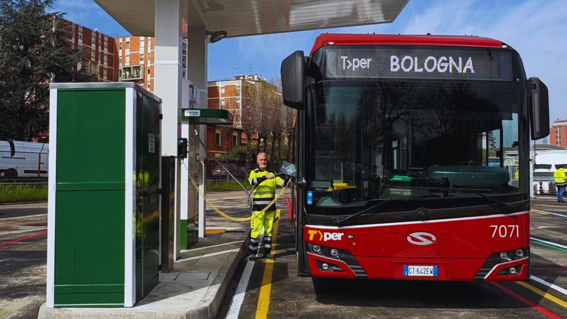 A red Solaris Urbino 12 fuel cell bus being refueled at TPER's Battindarno depot HRS