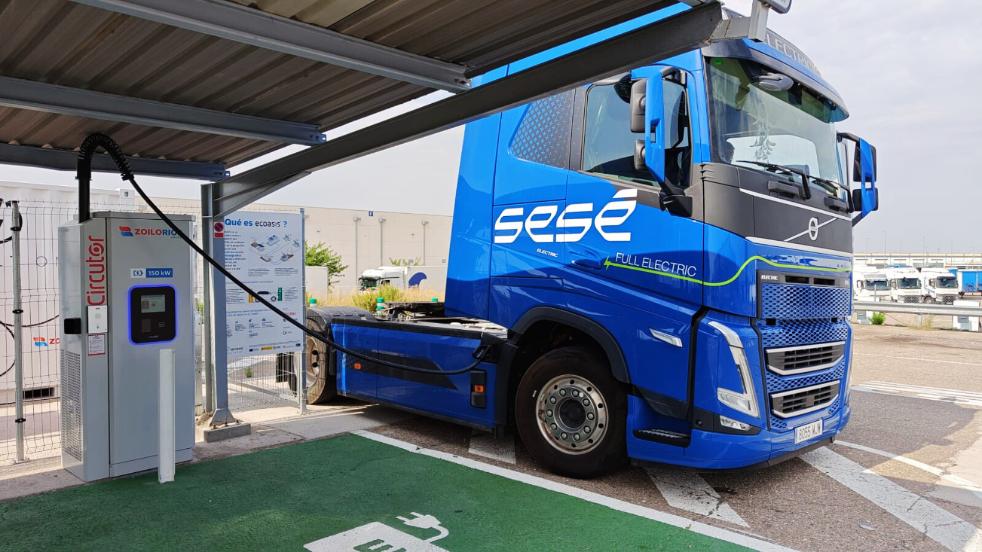 electric vehicle at fuel cell powered charging station
